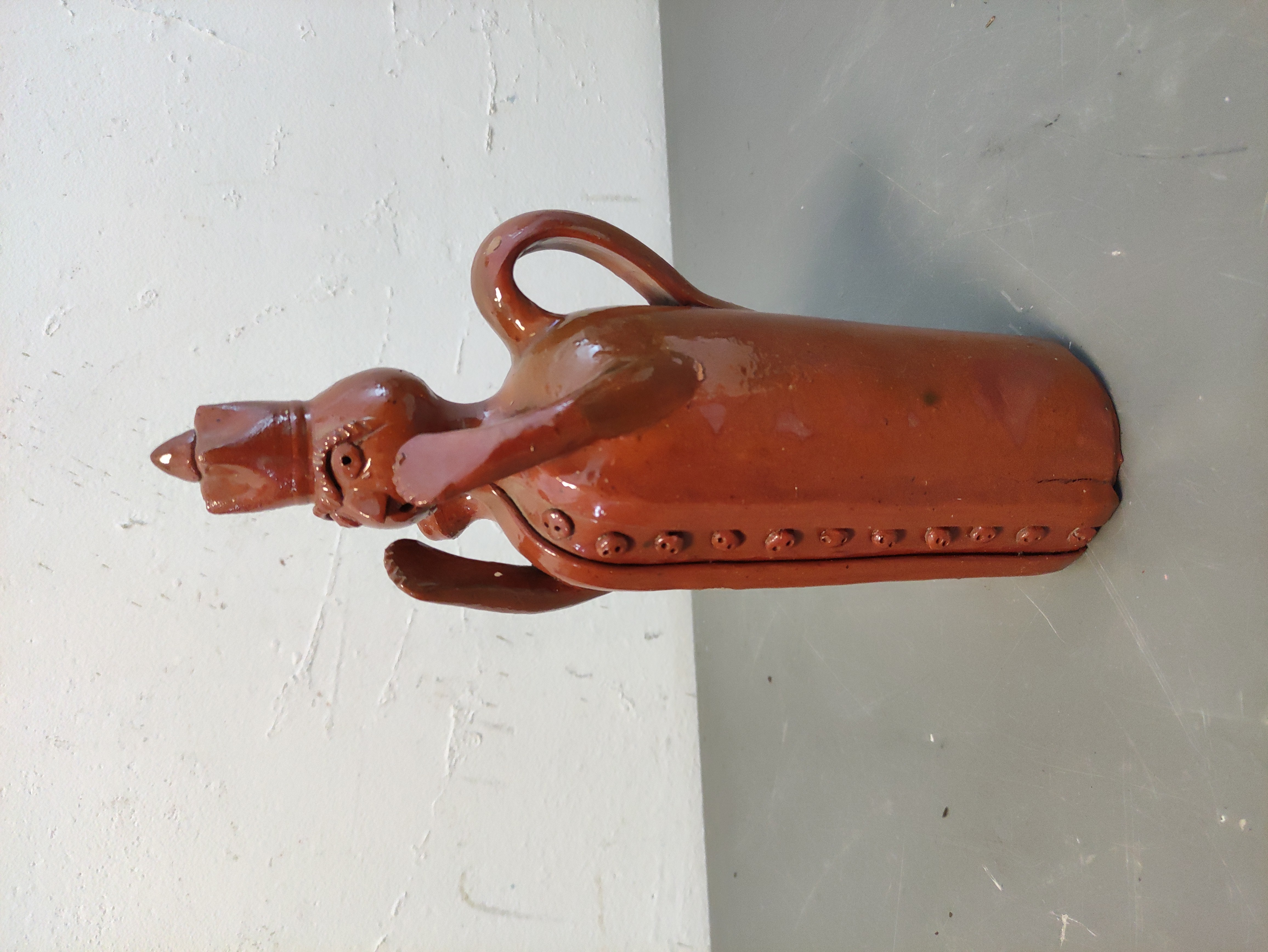 botella botijo figura cura terracota 29_5x20x8 1u